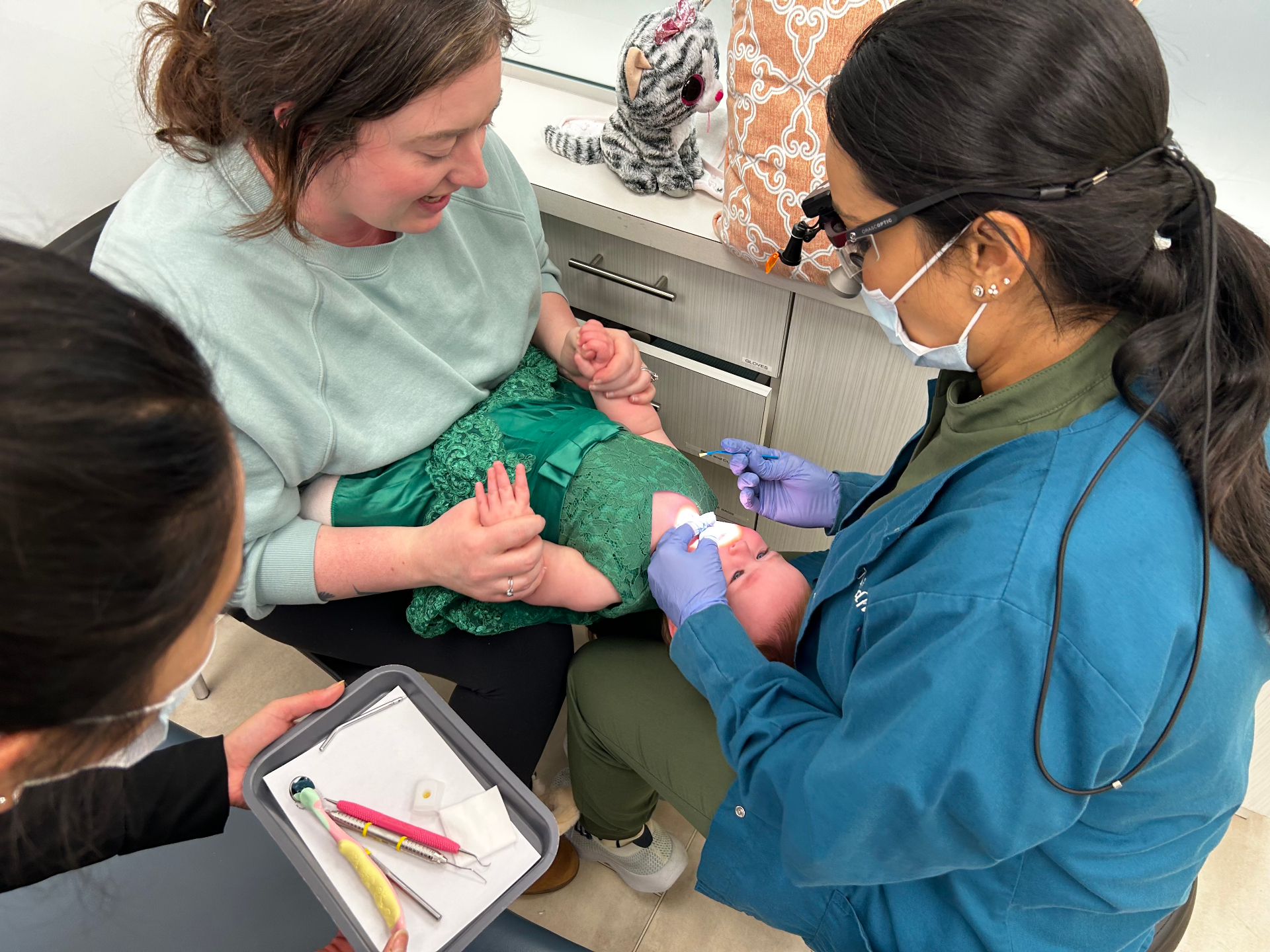 Dr. Nidhi treating an infant